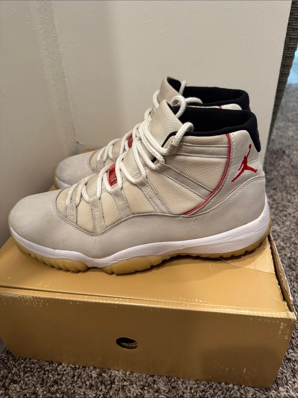 Jordan 11 Men's High-Top Sneakers in Off-White, Gum & Red Accents